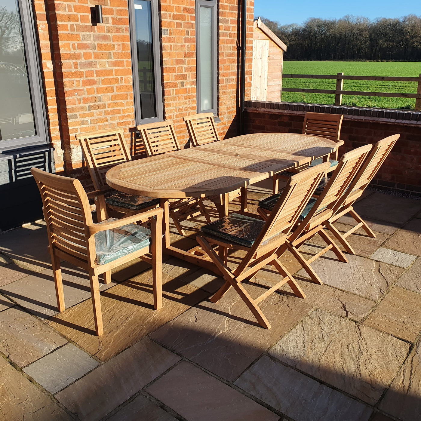 Teak Garden Furniture Set Extending Oval Table 180-240 cm (6 Folding & 2 Stacking Chairs ) Complete set Cushions Included - Royal finesse
