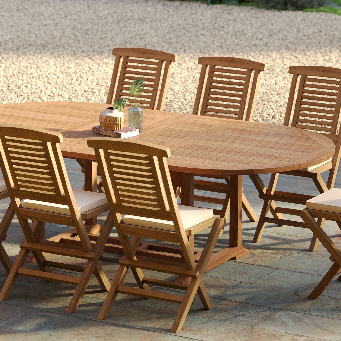 Angle view of Teak Oval Table and folding chairs 