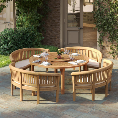 Teak garden furniture set displayed in a lush garden setting under sunlight
