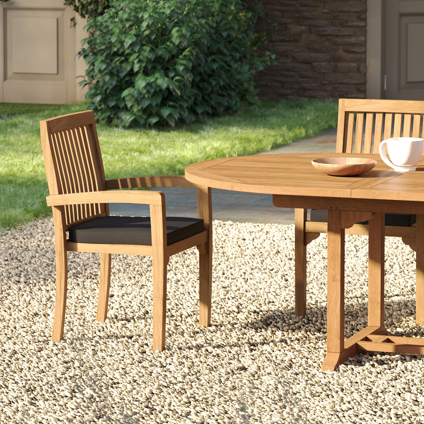Henley stacking chairs with black cushions neatly placed around the table