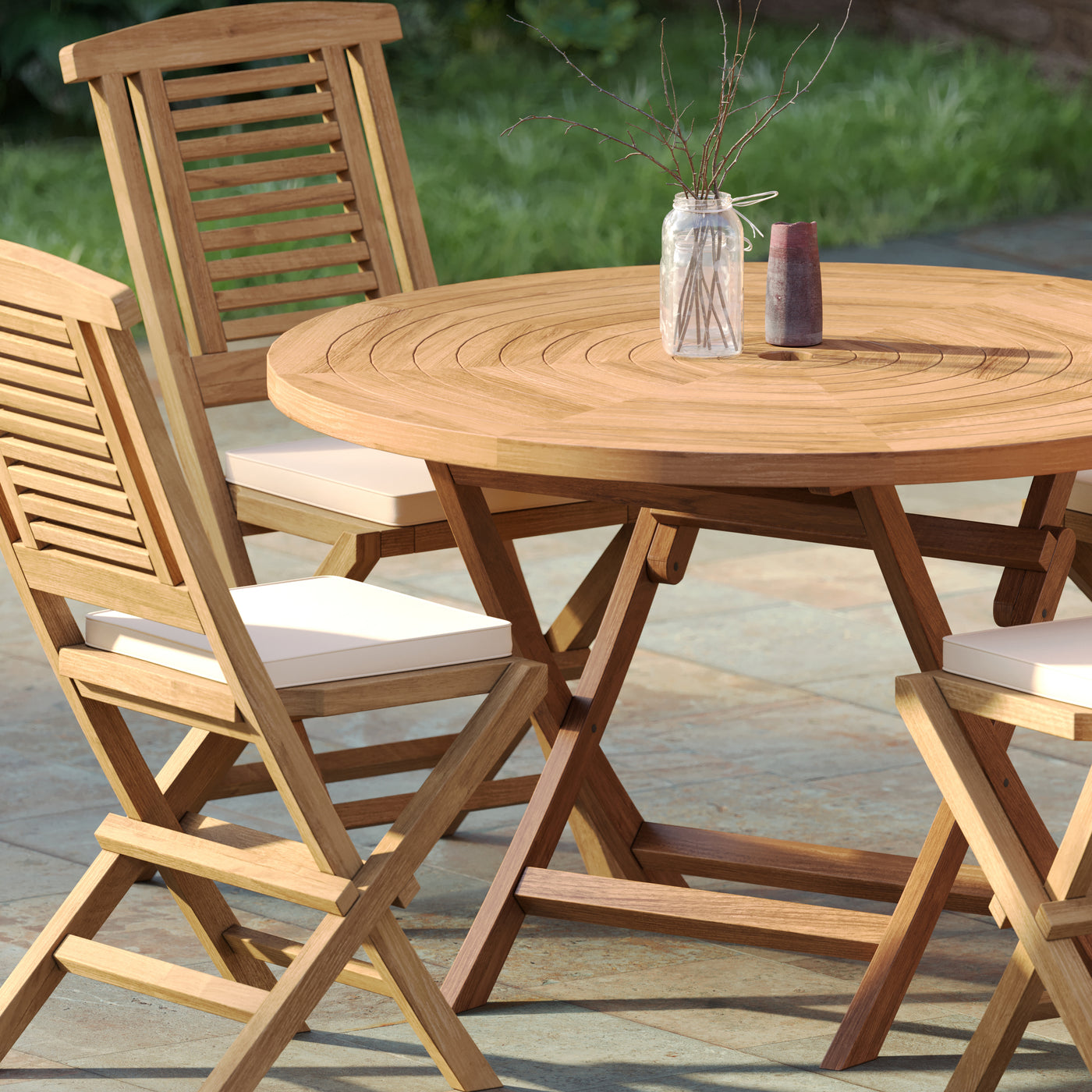 Compact outdoor teak dining set ideal for patios and small gardens