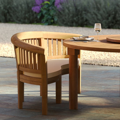 San Francisco bench with plush cushions around large round garden table