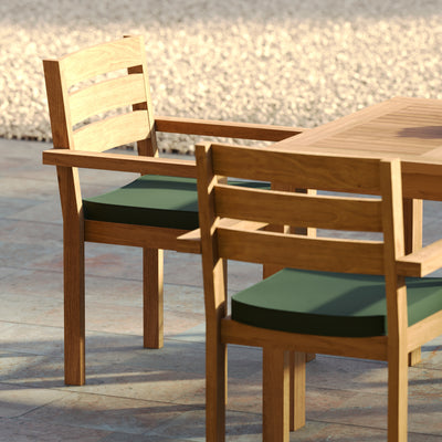 Close-up of Marlow stacking chair with cream cushion and slatted back